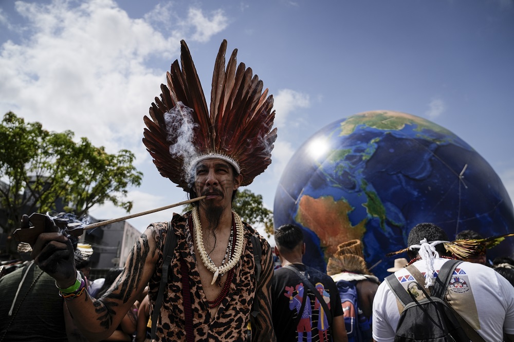 Jovem Tupinambá na Marcha Mundial pelo Clima (Foto: Fernando Martinho/Repórter Brasil)